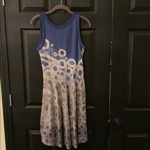 Form fitting too w flair bellow waist